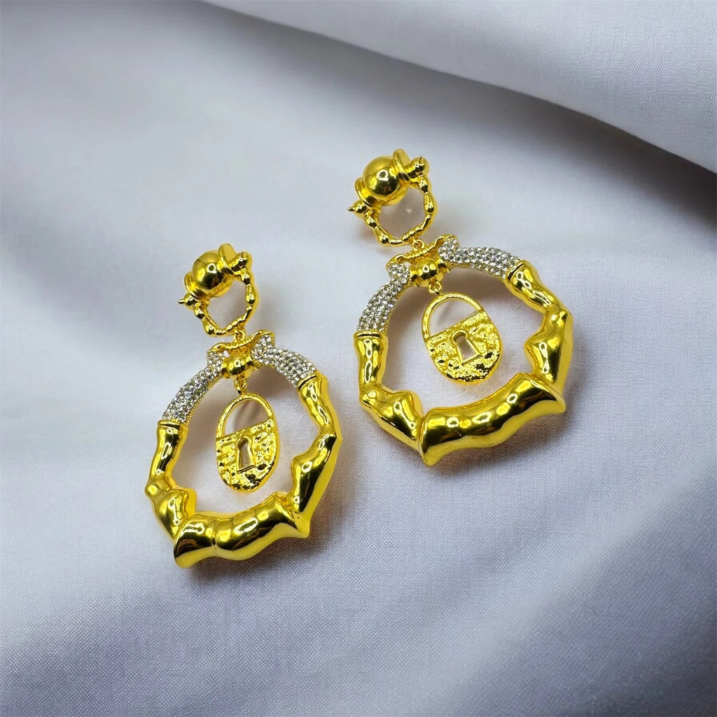 Gold Bamboo Hoop Earrings with Lock Charm – view 4