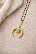 Gold Crescent Moon Evil Eye Necklace