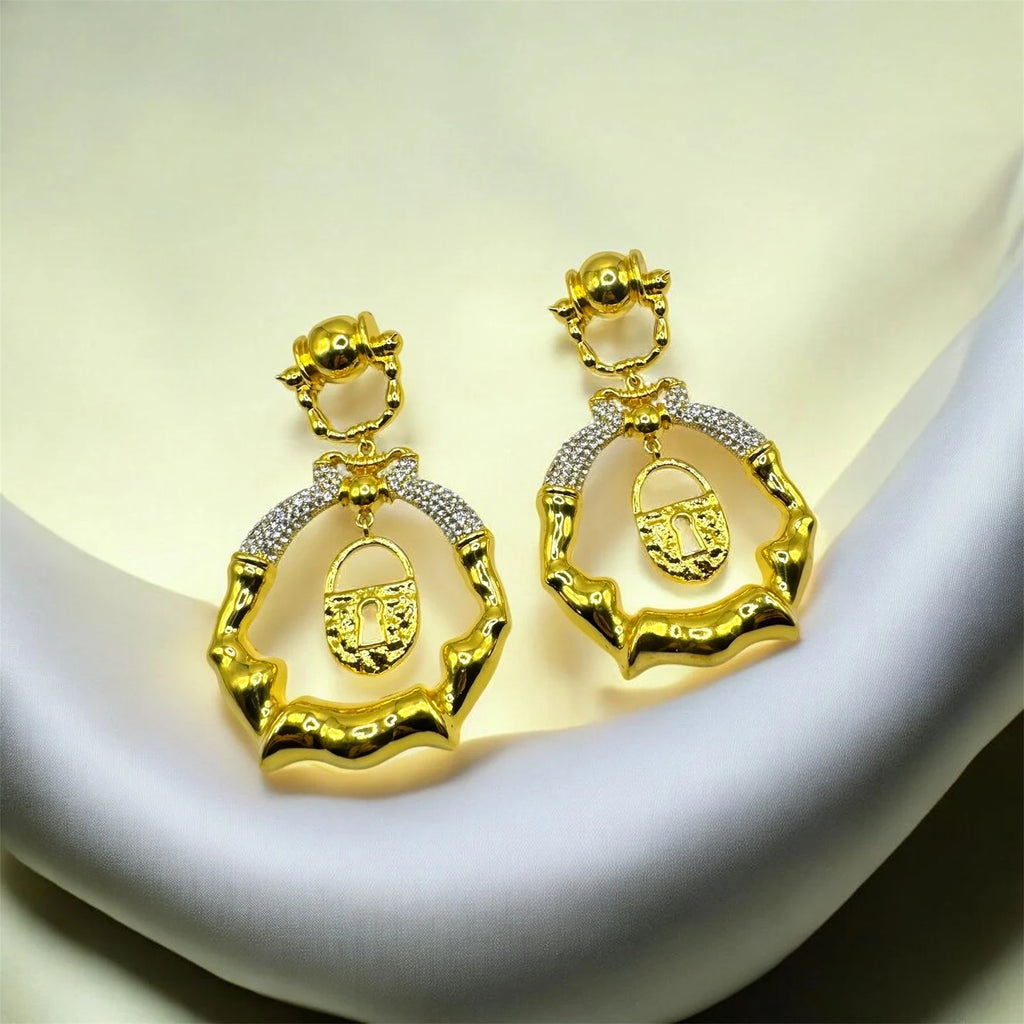 Gold Bamboo Hoop Earrings with Lock Charm – view 2