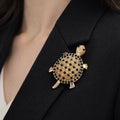 Gold Turtle Brooch with Black Stones